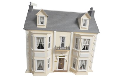 Lot 246 - A modern three storey Georgian doll’s house