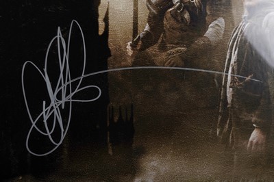 Lot 294 - Two signed Lord of the Rings film posters; and a Lord of the Rings 'Middle Earth' map poster