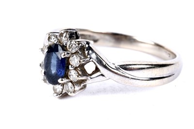 Lot 200 - A sapphire and diamond flower cluster dress ring