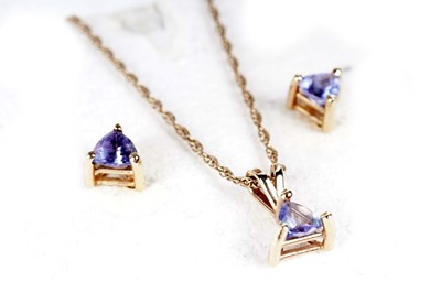 Lot 197 - A pair of trilliant cut tanzanite stud earrings; and pendant