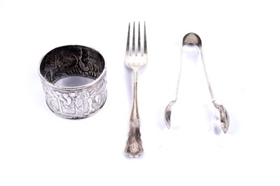 Lot 995 - A Chinese white metal napkin ring; and a silver fork and pair of sugar tongs