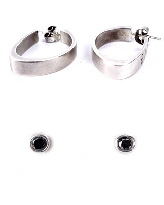 Lot 205 - A pair of Georg Jensen silver hoop earrings; and a pair of stud earrings