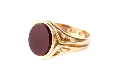 Lot 128 - A Victorian carnelian and 22ct gold signet ring