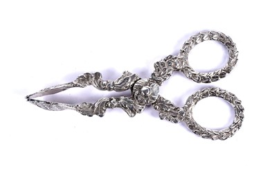 Lot 1112 - A pair of Victorian silver sugar tongs