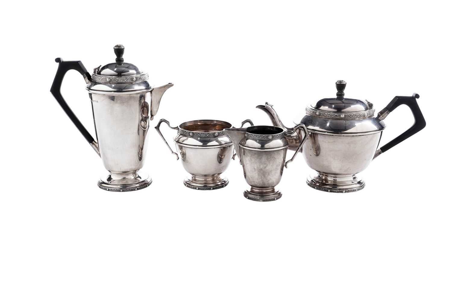 Lot 11 - A George V silver four-piece tea service, by Duncan & Scoobie, Birmingham 1935