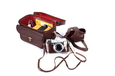 Lot 242 - A Kodak Retina Reflex camera and a selection of Kodak camera accessories