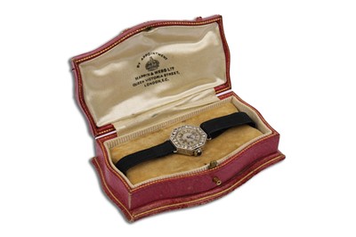 Lot 603 - Vertex: a platinum cased lady's diamond set cocktail watch