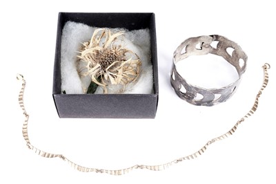 Lot 246 - A silver bangle; and a gold necklace