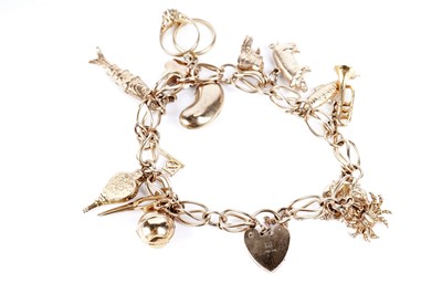 Lot 156 - A 9ct yellow gold charm bracelet