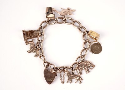 Lot 167 - A 9ct gold charm bracelet