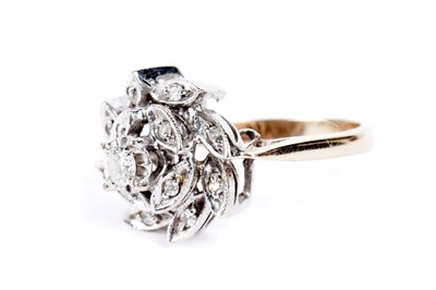 Lot 185 - A diamond cluster dress ring