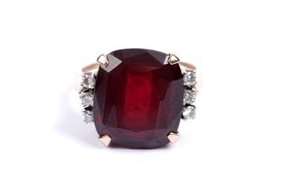 Lot 609 - A synthetic ruby and diamond ring