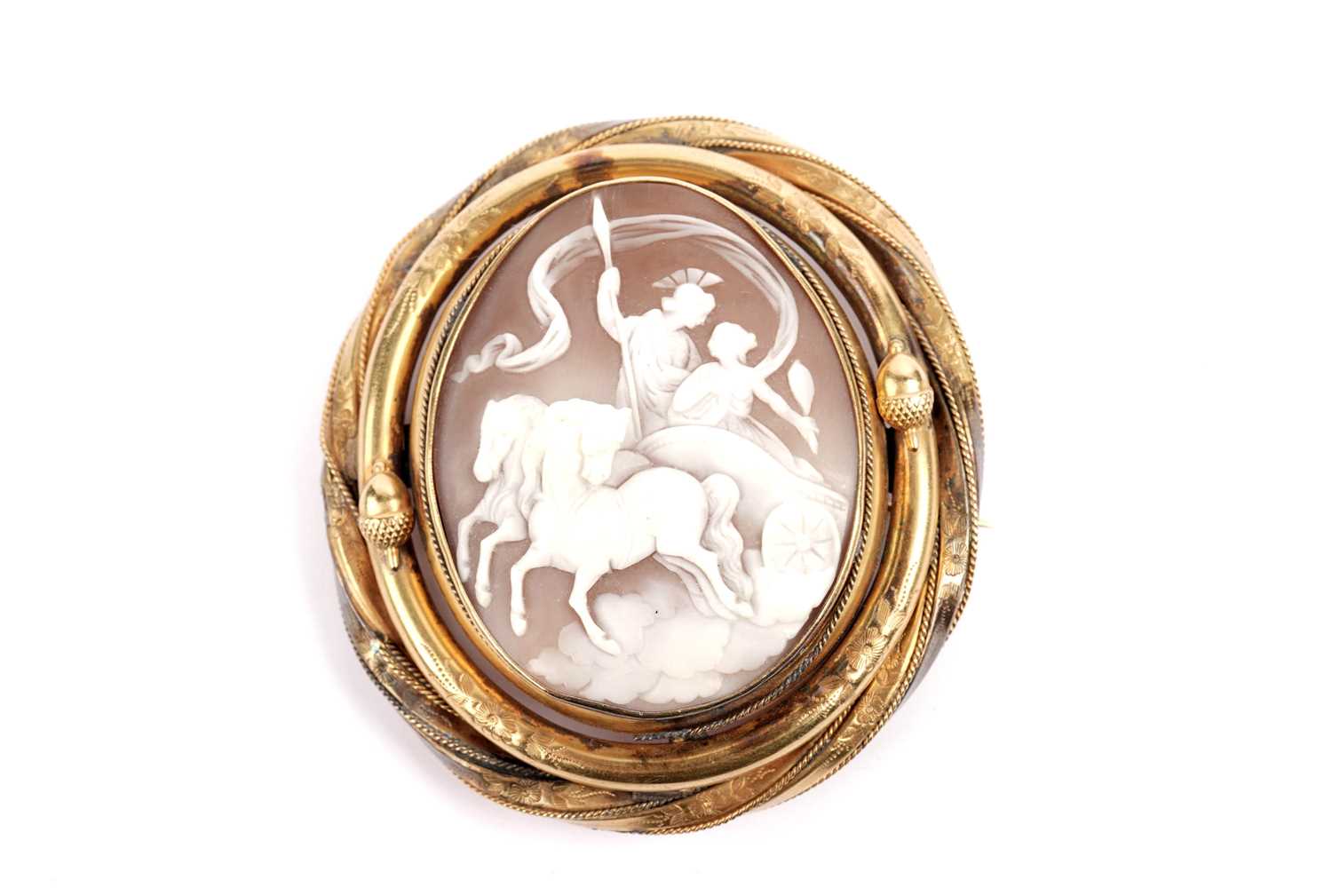 Lot 608 - A Victorian carved shell cameo brooch,
