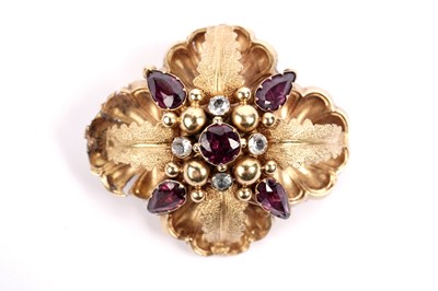 Lot 604 - A Victorian gold and garnet brooch