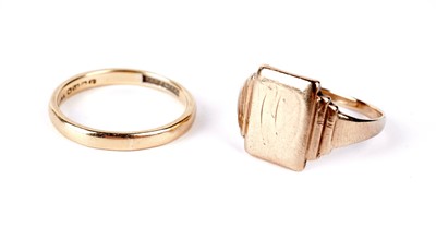 Lot 169 - An 18ct yellow gold wedding band and a 9ct signet ring