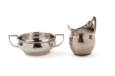 Lot 323 - Georgian silver cream jug; and a silver twin-handled sugar bowl