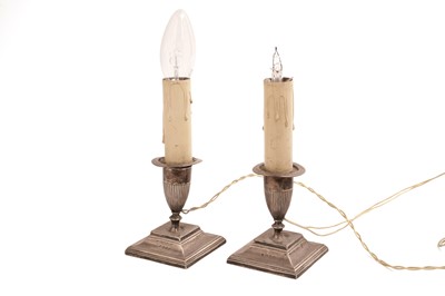 Lot 317 - A pair of late Victorian silver candlesticks, adapted to table lamps