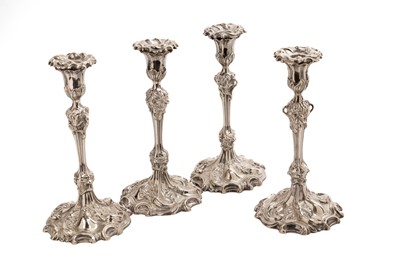 Lot 326 - A set of four Victorian silver plated candlesticks