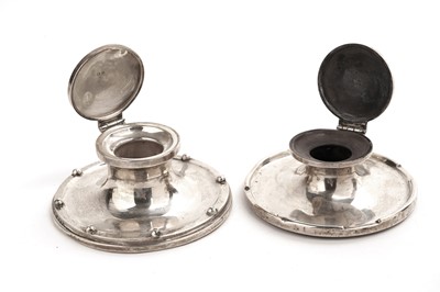 Lot 328 - Two silver capstan inkwells