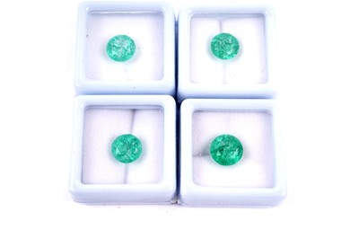 Lot 248 - Four certificated loose round cut emeralds