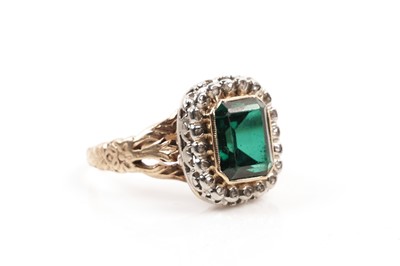 Lot 249 - A green stone and diamond cluster ring