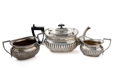 Lot 1035 - A late Victorian silver three-piece silver tea service, by William Aitken, Chester 1899