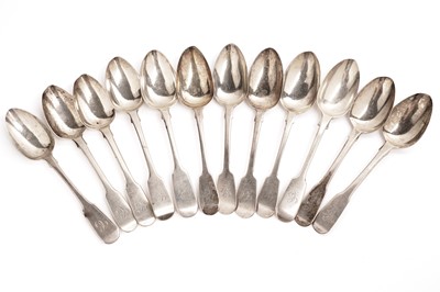 Lot 371 - A harlequin set of silver fiddle pattern table spoons