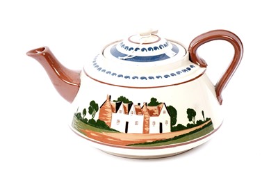 Lot 415 - A substantial Torquay ware teapot