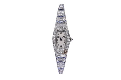 Lot 715 - A sapphire and diamond cocktail watch