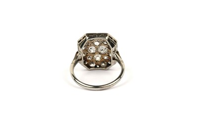 Lot 718 - A diamond plaque dress ring