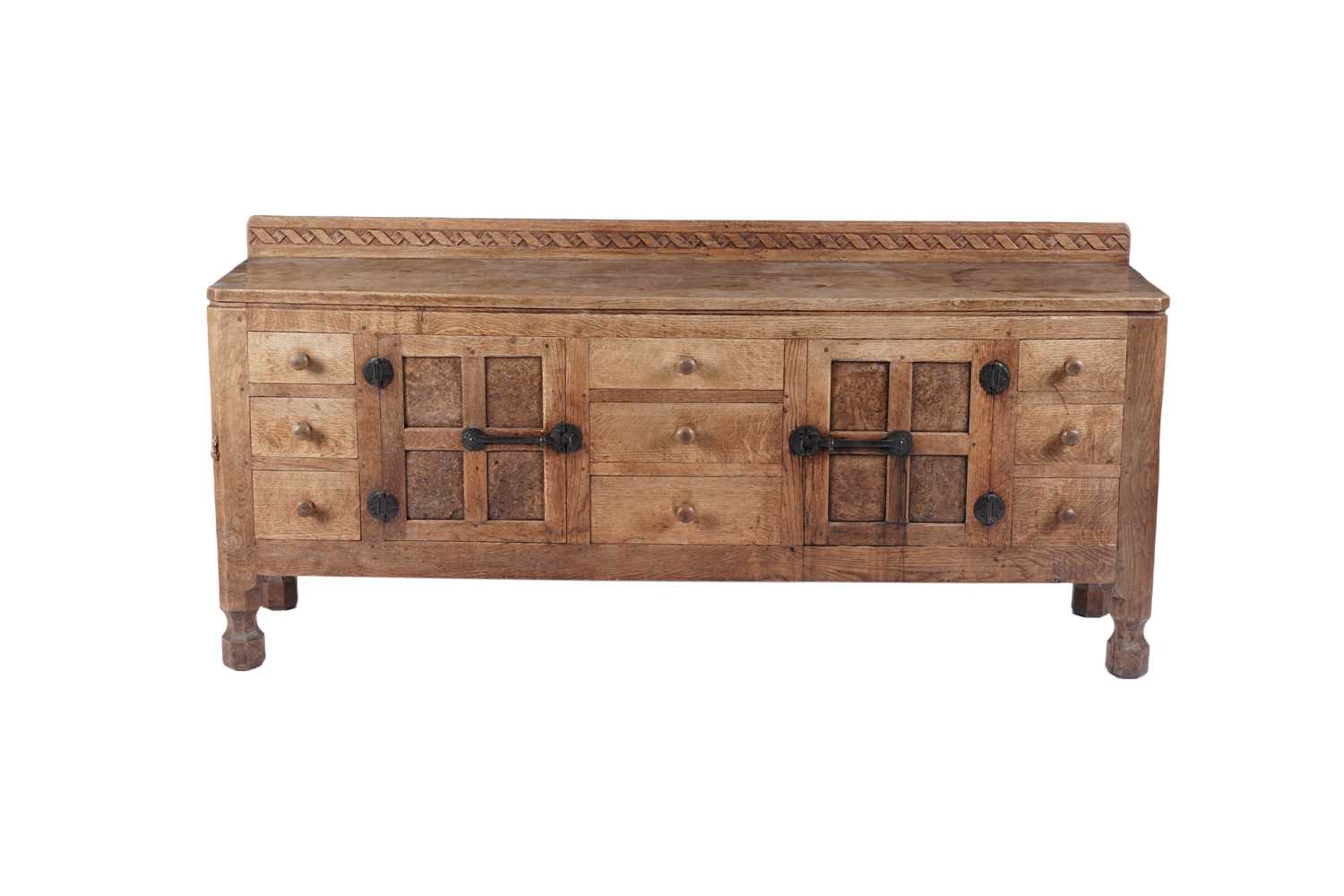 Lot 1426 - Robert ‘Mouseman’ Thompson of Kilburn: a rare oak and burr oak sideboard