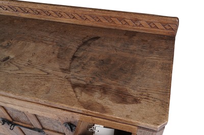 Lot 1426 - Robert ‘Mouseman’ Thompson of Kilburn: a rare oak and burr oak sideboard