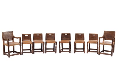 Lot 1428 - Robert ‘Mouseman’ Thompson of Kilburn: a set of eight rare oak and leather panel back dining chairs