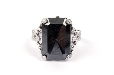 Lot 755 - A black diamond and diamond ring, by Joseph Bonnar