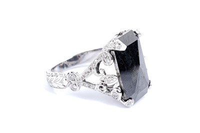 Lot 755 - A black diamond and diamond ring, by Joseph Bonnar