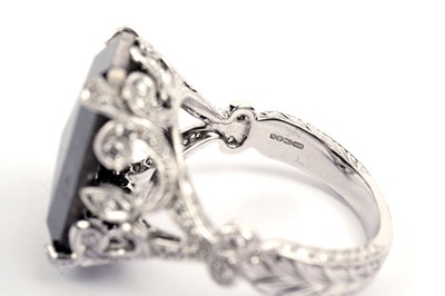 Lot 755 - A black diamond and diamond ring, by Joseph Bonnar