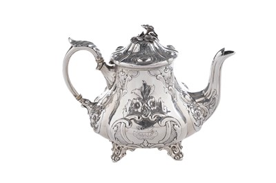 Lot 193 - A Victorian Scottish silver teapot of baluster form