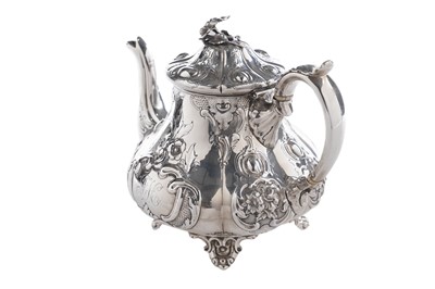 Lot 193 - A Victorian Scottish silver teapot of baluster form