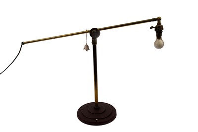 Lot 197 - An industrial style brass table lamp