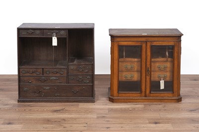 Lot 145 - An early 20th Century oak smokers’ cabinet; and another tabletop cabinet