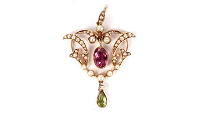 Lot 772 - An Edwardian pink-tourmaline, peridot and seed pearl pendant