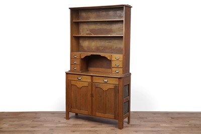 Lot 127 - An early 20th Century oak kitchen cabinet