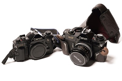 Lot 840 - A Canon A-1; and EF SLR cameras