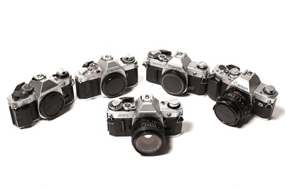 Lot 841 - Five Canon SLR camera bodies; a two Canon lenses