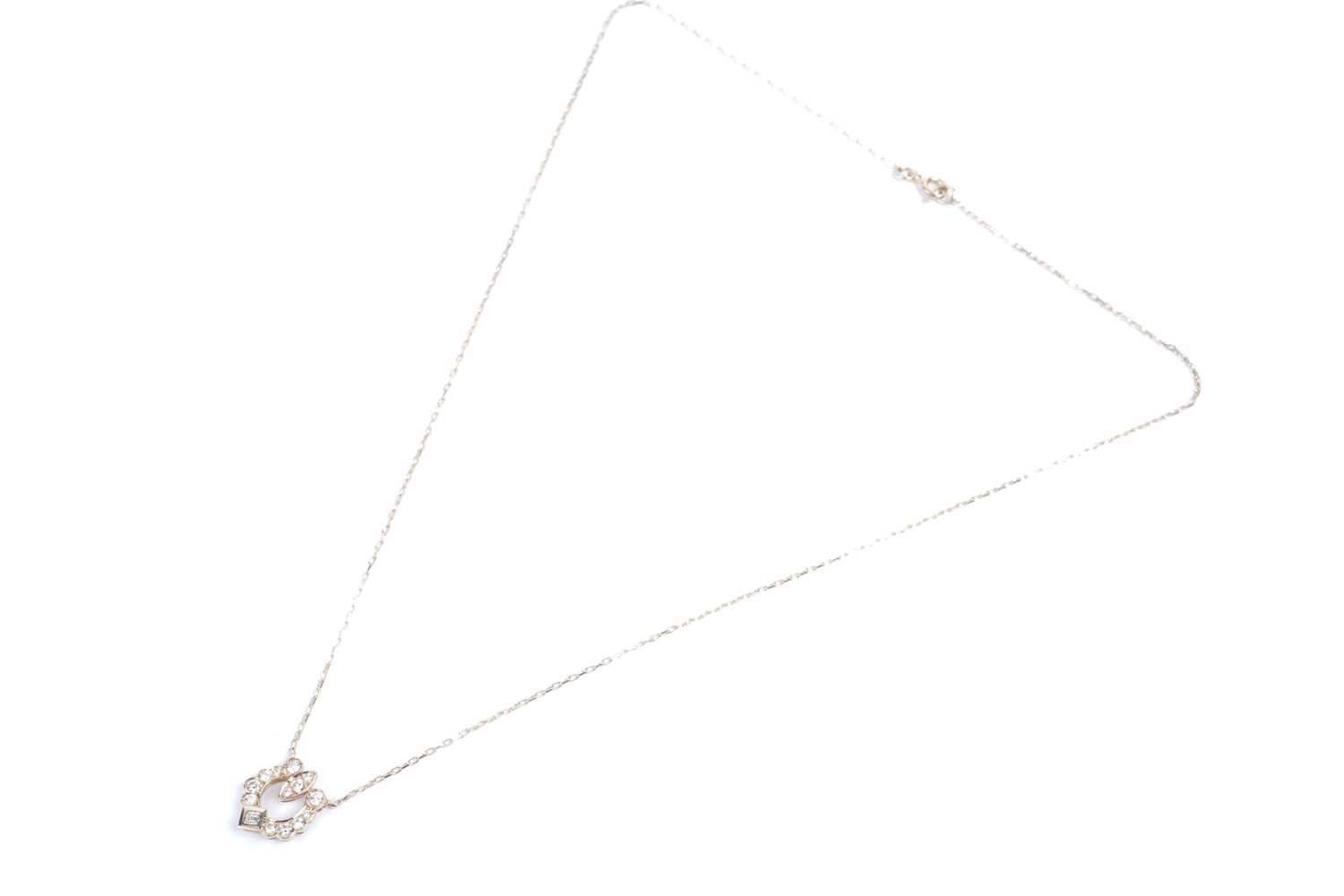 Lot 774 - Cartier, Paris: a diamond pendant