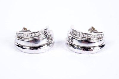 Lot 921 - A pair of diamond set 18ct white gold earrings