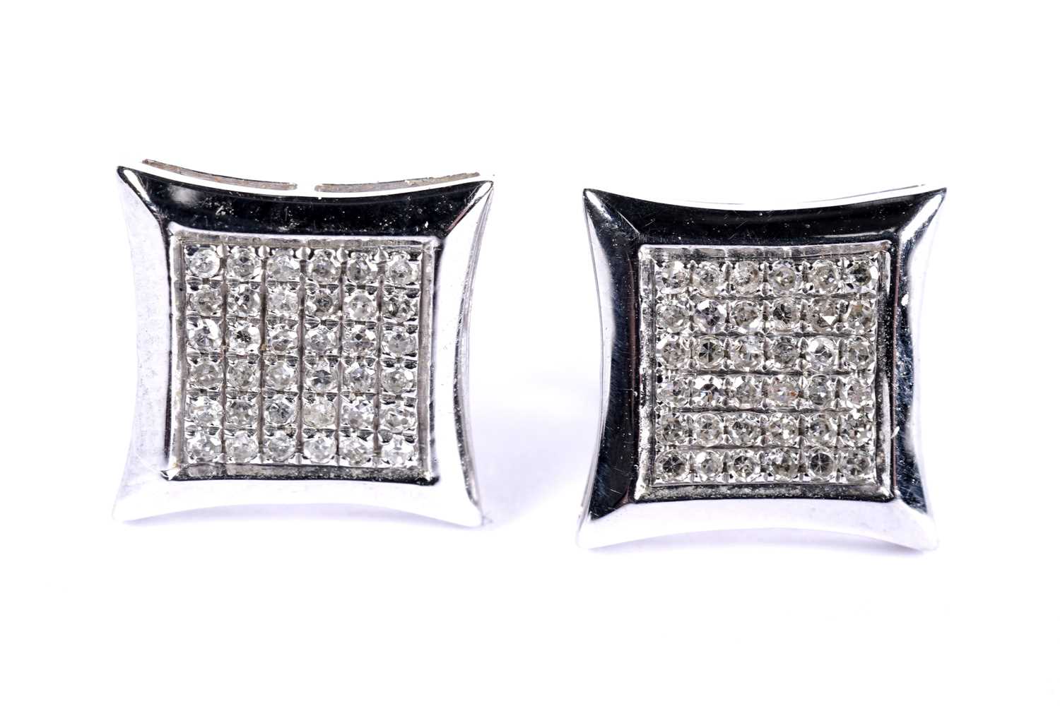 Lot 95 - A pair of diamond earrings