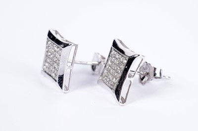 Lot 95 - A pair of diamond earrings