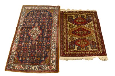 Lot 153 - Two Caucasian rugs including: a Hamadan rug