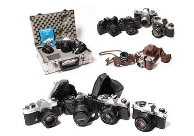 Lot 266 - A selection of SLR cameras by Yashica, Fujica and Prakitca